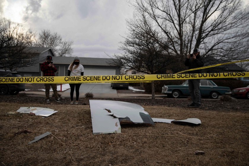 Faltering flight scatters large debris on US city