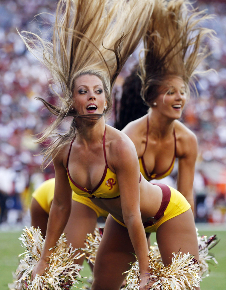Washington Redskins cheerleaders perform during the NFL football game between the Redskins and the Houston Texans in Landover