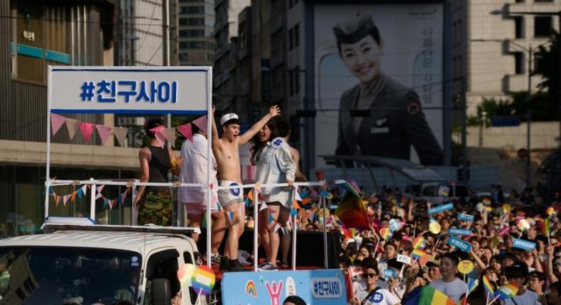 In last year's parade on June 28, 2015 participants dance and wave banners as part of the 'Korea Queer Festival' in Seoul