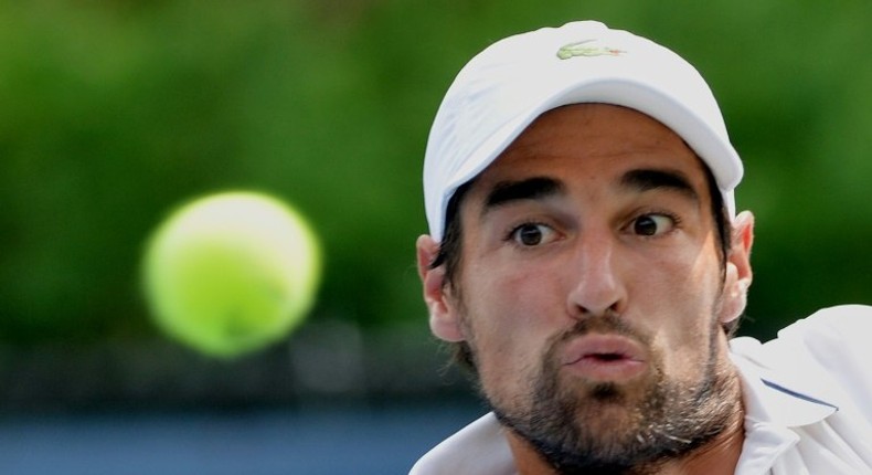 Jeremy Chardy eyes the ball at the USTA Billie Jean King National Tennis Center on August 30, 2013, in New York