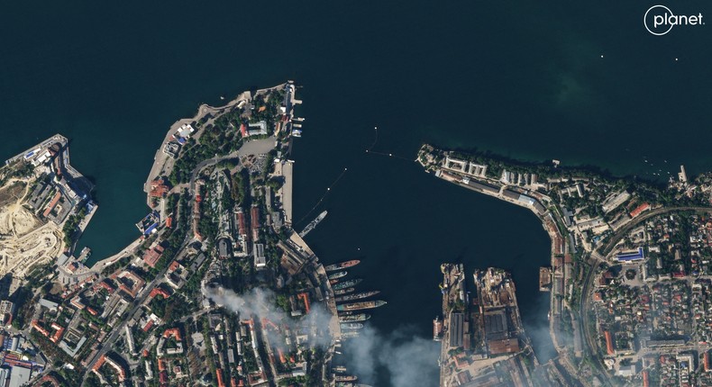 A satellite image shows smoke billowing from a Russian Black Sea Navy HQ after a missile strike, as Russia's invasion of Ukraine continues, in Sevastopol, Crimea, September 22, 2023.PLANET LABS PBC/Handout via REUTERS