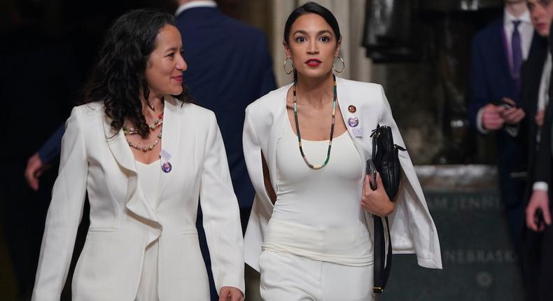 Rep. Alexandria Ocasio Cortez (D-NY) arrives with guest Ana Maria Archilla of New York, before U.S. President Donald Trump delivers his second State of the Union address to a joint session of Congress in the House Chamber on Tuesday.