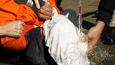 File photo of demonstrators simulating waterboarding at the Justice Department in Washington