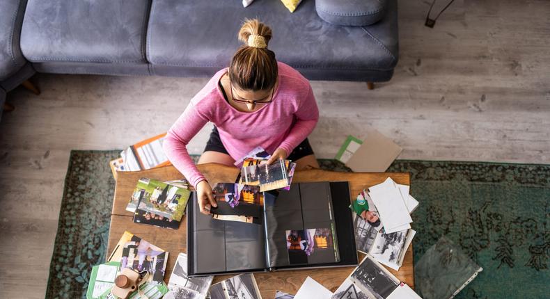 A woman assembles her photo albumKemal Yildirim/Getty Images