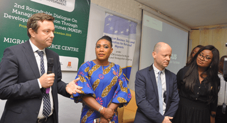 The European Union (EU) Ambassador to Nigeria and the Economic Community of West African States (ECOWAS), Mr. Ketil Karlsen (left); Programme Manager, International Organisation for Migration (IOM), Nigeria, Abraham Tamrat; Uyi Malaki (2nd left); Project Manager, Managing Migration Through Development Programme (MMDP), Dr. May Ikeora (right). [Vanguardngr]