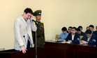 KCNA picture shows U.S. student Otto Warmbier crying at court in an undisclosed location in North Korea