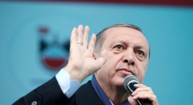 The spokesman for Turkish President Recep Tayyip Erdogan (pictured) said the US strike against the Sharyat airbase in Homs was a positive response