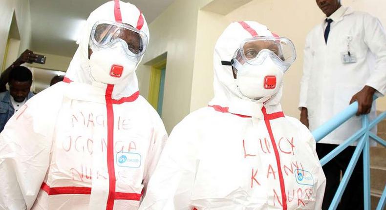 File image of medics wearing protective gear at Mbagathi Hospital in Nairobi where an isolation and treatment centre for the new coronavirus was set up on March 6