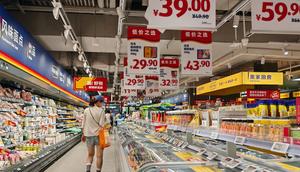 Residents select products at a supermarket in Shanghai, China.CFOTO/Future Publishing/Getty Images