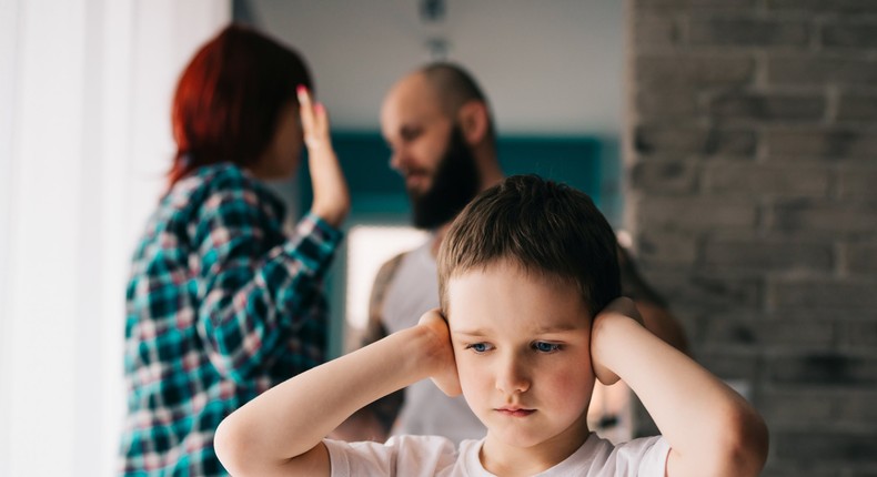 child sad parents fighting