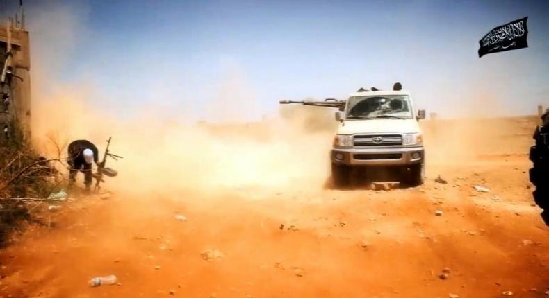 An image from Ansar al-Sharia's official media outlet allegedly shows militants of the jihadist group during a battle in the Libyan city of Benghazi