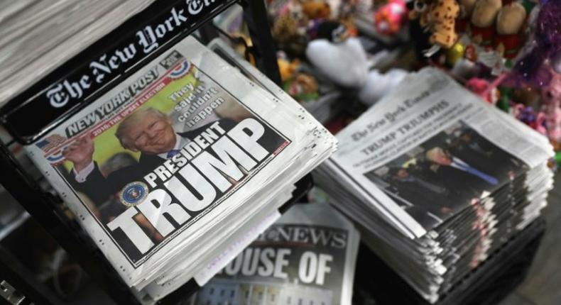 Front pages from New York City newspapers feature President-elect Donald Trump, on November 9, 2016