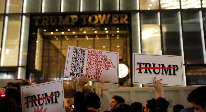  People protest outside Trump Tower following President-elect Donald Trump's election victory in Manhattan, New York, U.S., November 9, 2016. 