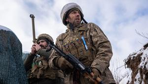 Ukrainian soldiers patrol on the frontline in Zolote, Ukraine on January 20, 2022.
