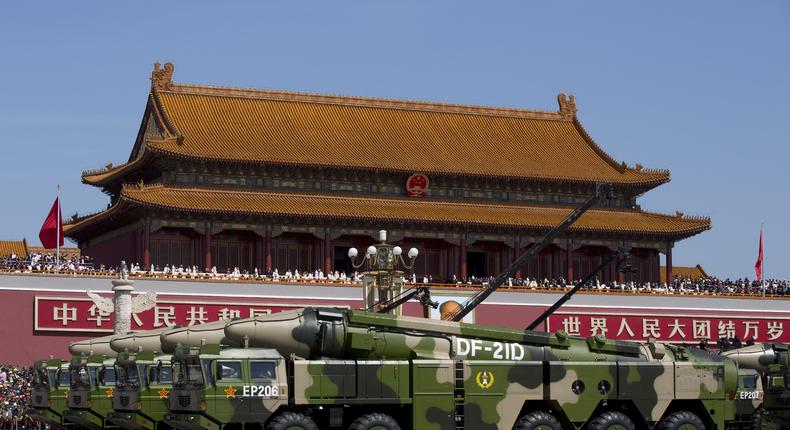 Chinese military vehicles carrying DF-21D anti-ship ballistic missiles, potentially capable of sinking a U.S. Nimitz-class aircraft carrier in a single strike, drive past the Tiananmen Gate during a military parade to mark the 70th anniversary of the end of World War Two on September 3, 2015, in Beijing, China.Andy Wong - Pool /Getty Images