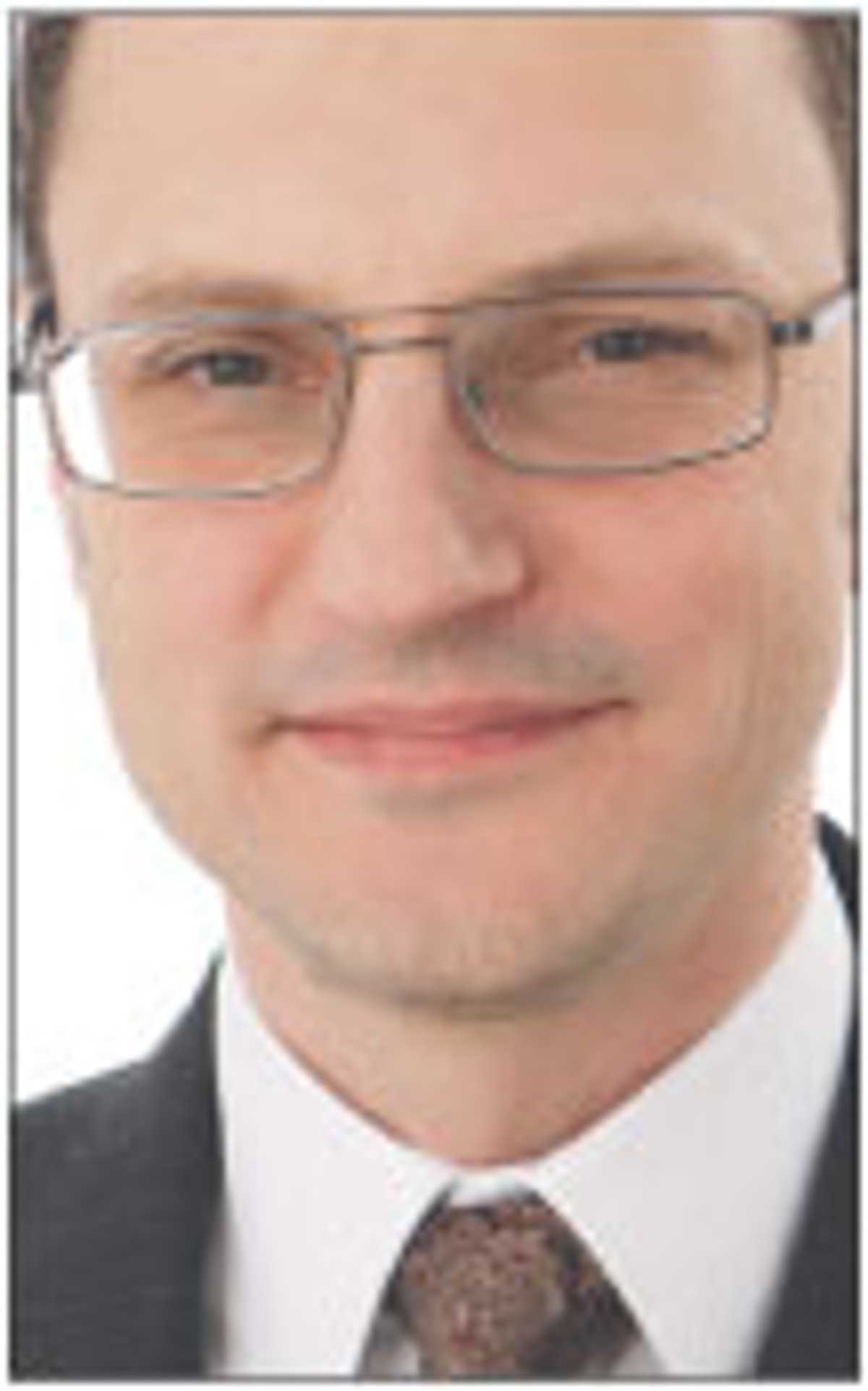 Andrzej Chełchowski, doktor, prawnik w kancelarii Miller Canfield