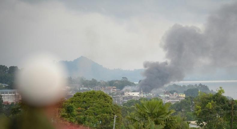 Philippine President Rodrigo Duterte imposed martial law across the whole southern region of Mindanao on Tuesday, hours after gunmen loyal to the IS group rampaged through the city