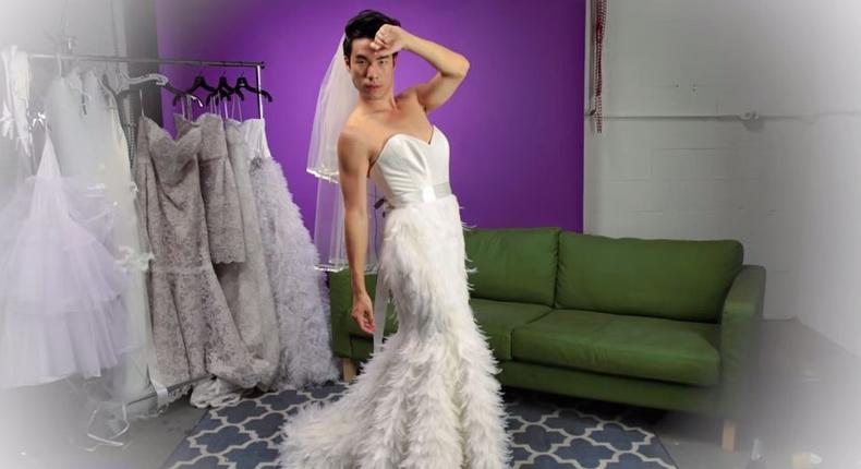 Eugene in a couture gown with a feathered skirt