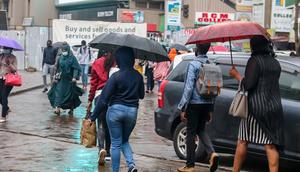 People walking in the rain