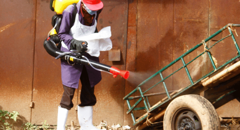 A local resident fumigates an area in Ruaka, Kiambu County (Photo: Courtesy)