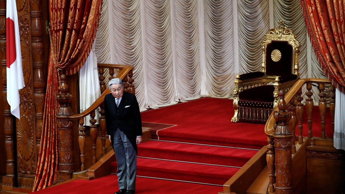 Japan's Emperor Akihito leaves from his seat after he declared the opening of an ordinary session of