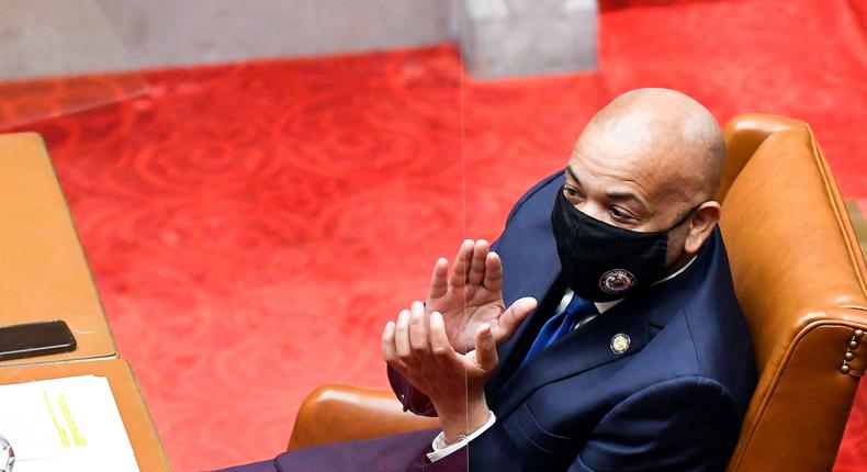 Assembly Speaker Carl E. Heastie applauds as New York Governor Andrew Cuomo speaks to members of New York state's Electoral College before voting for President and Vice President in the Assembly Chamber at the state Capitol in Albany, New York on December 14, 2020
