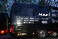 FILE PHOTO: The Borussia Dortmund team bus is seen after an explosion near their hotel before the game