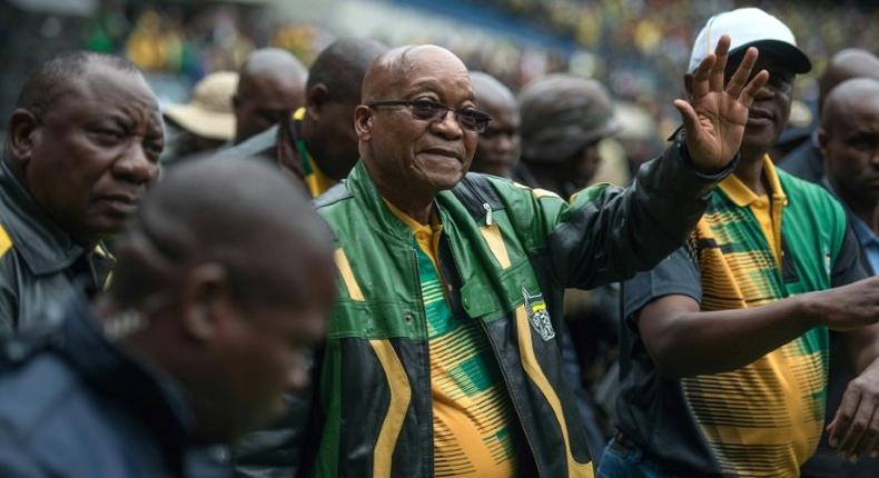 South African President Jacob Zuma (C) has faced growing criticism over a series of corruption scandals, worsening unemployment levels and slowing economic growth