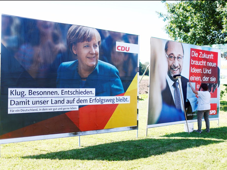 Posters for the two main candidates in the German elections, Angela Merkel and Martin Schulz.