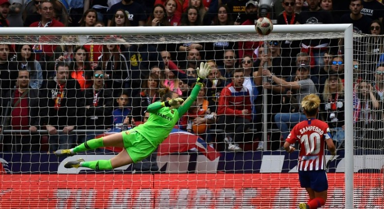 Barcelona goalkeeper Sandra Panos dives to make a save during a match against Atletico Madrid earlier this year.