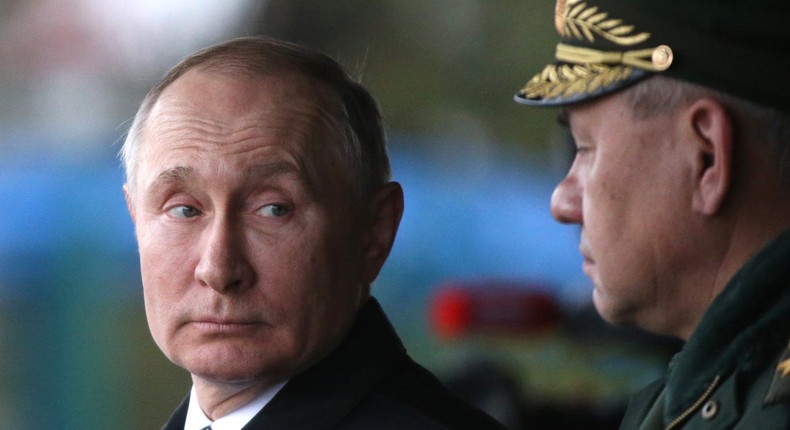 Russian President Vladimir Putin (L) looks on Defence Minister Sergei Shoigu (R) during a military parade in Pskov, Russia, on March,1, 2020.Mikhail Svetlov/Getty Images