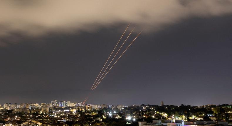 An anti-missile system operates after Iran launched drones and missiles towards Israel, as seen from Ashkelon, Israel on April 14, 2024.REUTERS/Amir Cohen