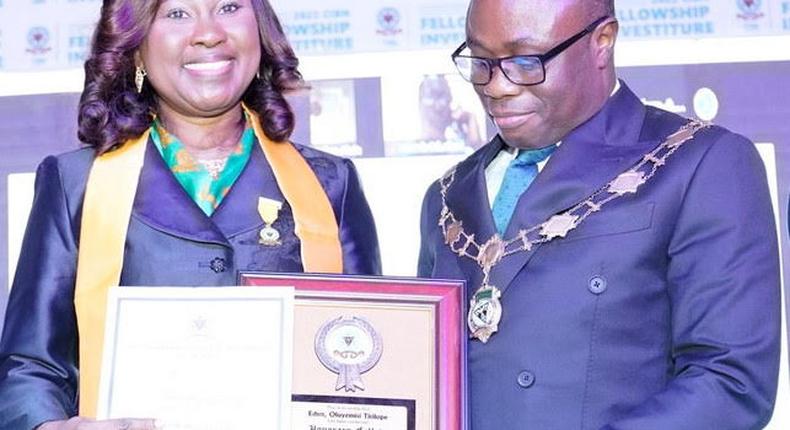 Managing Director, First City Monument Bank (FCMB), Mrs. Yemisi Edun, receiving Honorary Fellowship Award of the Chartered Institute of Bankers of Nigeria (CIBN) from the President/Chairman of Council of the Institute. Mr. Ken Opara, during the Investiture Ceremony of the Institute held on October 29, 2022 in Lagos.