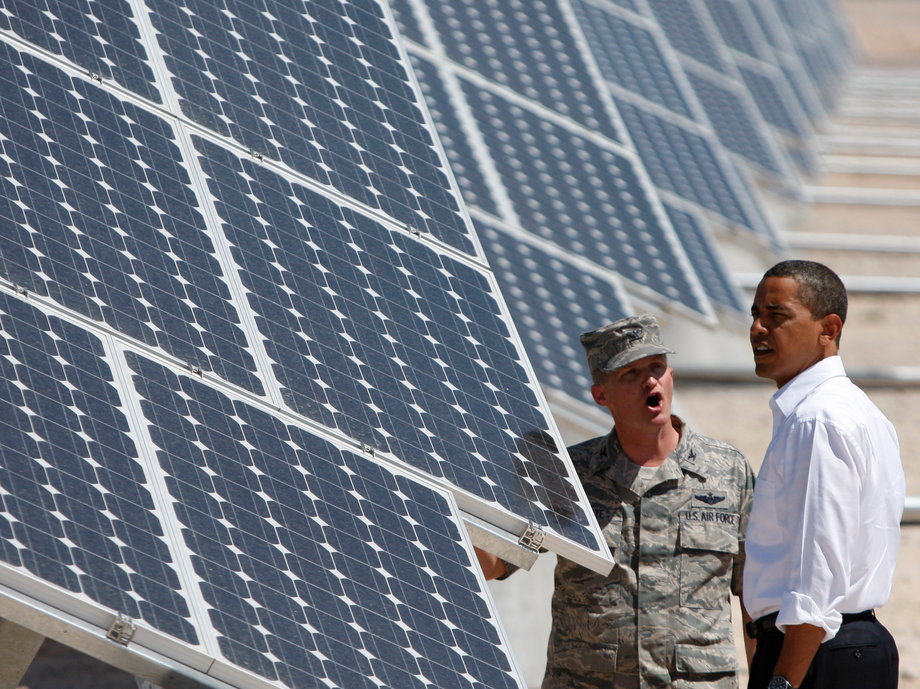President Barack Obama inspects an array of solar panels with Col. Howard Belote at Nellis Air Force Base in Las Vegas on May 27, 2009.