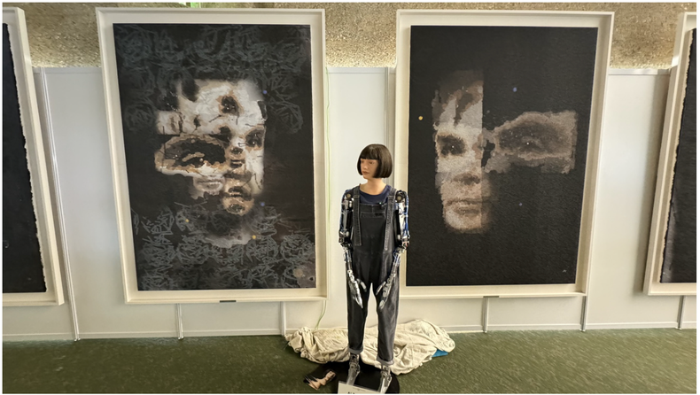 Ai-Da Robot in front of their AI-created “AI-God. Picture: EPA/SOTHEBY'S