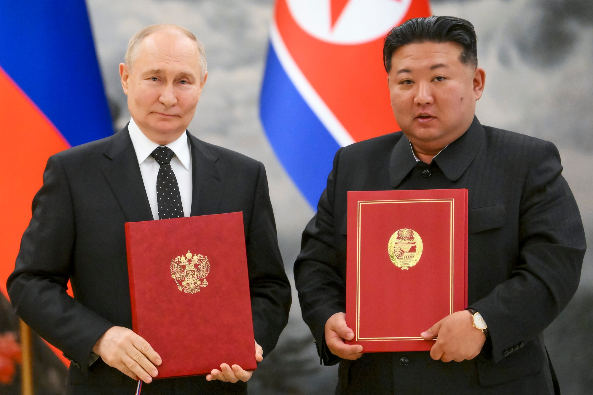 Ruský prezident Vladimir Putin počas návštevy Severnej Kórey a severokórejský vodca Kim Čong-un.