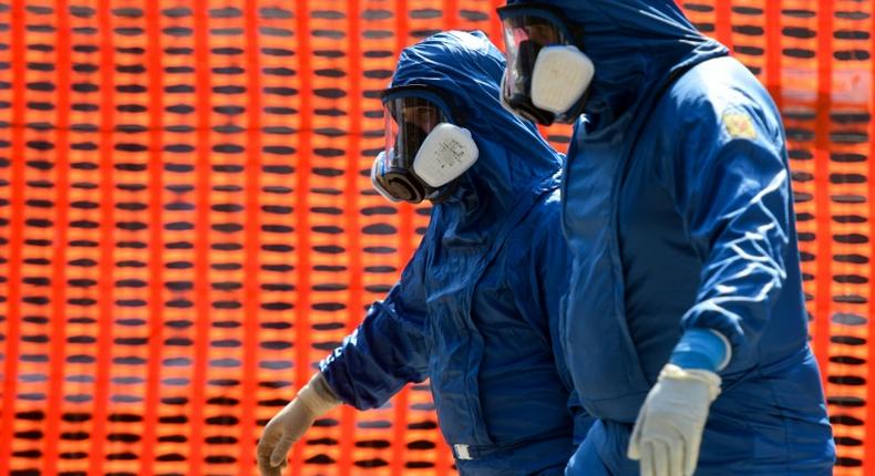 Russian army specialists outside a nursing home in the Lombardy region, the epicentre of the coronavirus outbreak in Italy