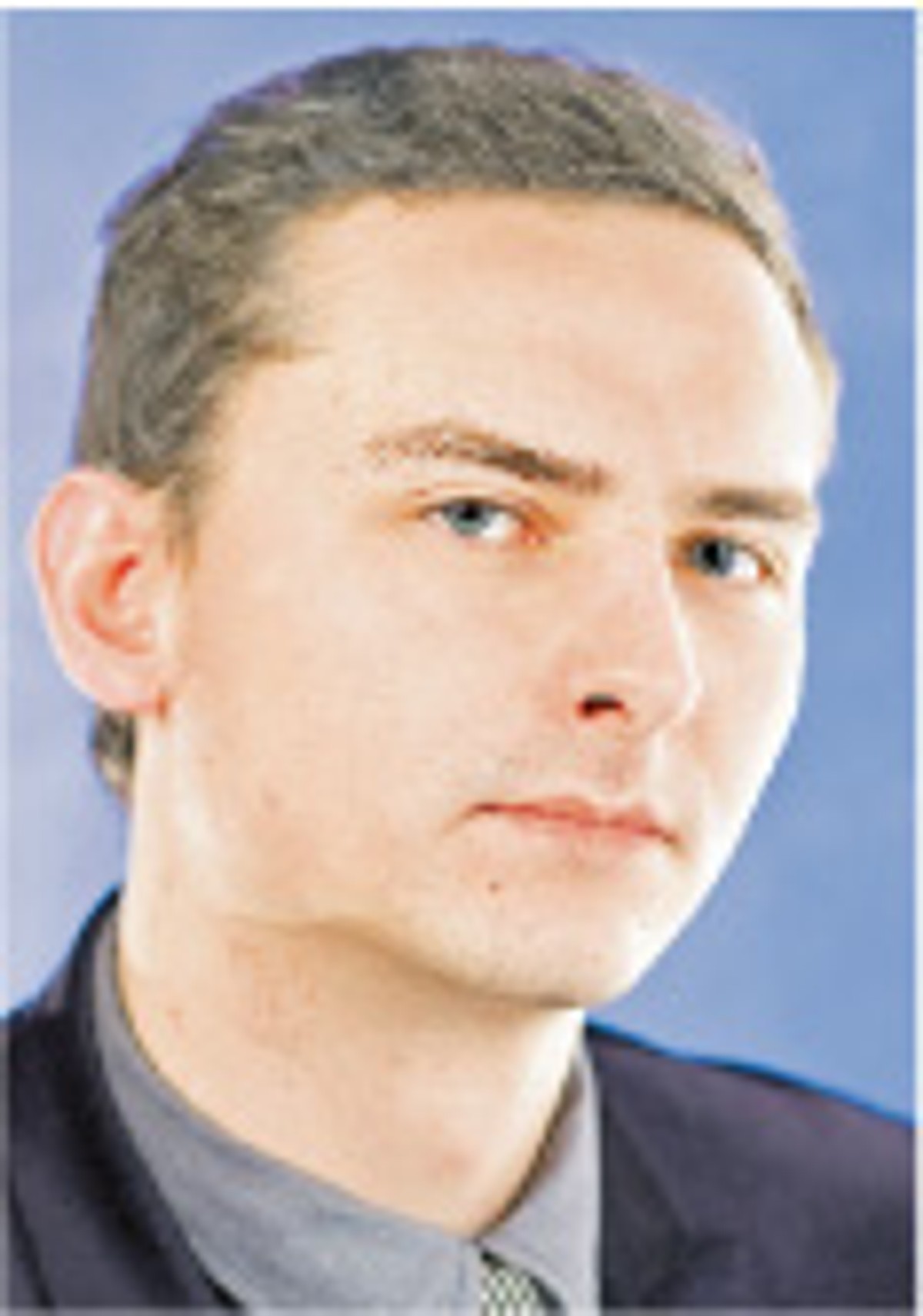 Łukasz Guza, dziennikarz działu praca