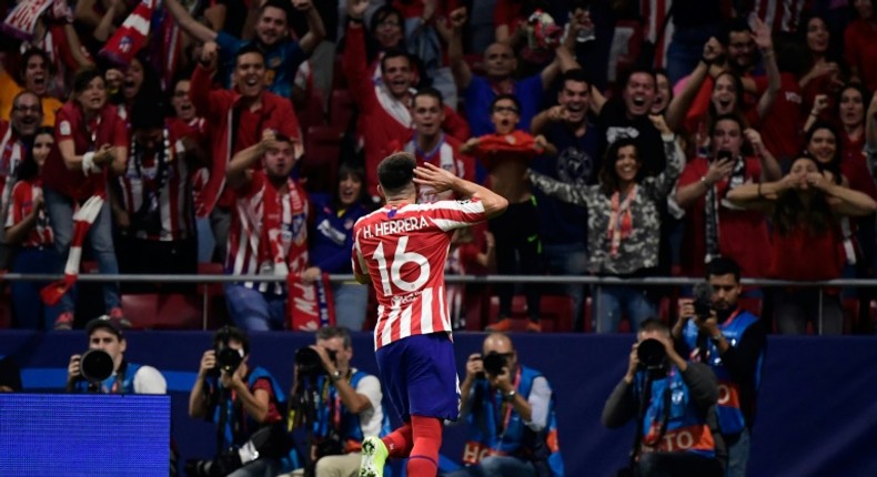 Mexican midfielder Hector Herrera crashed home Atletico Madrid's leveller to snatch a late point