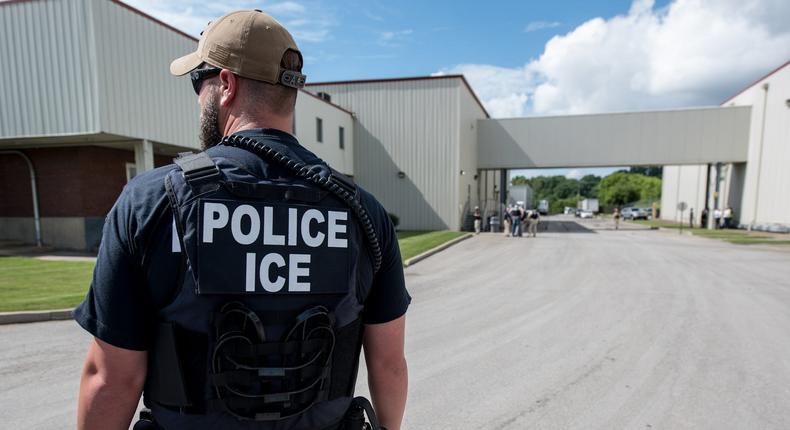 US Immigration and Customs Enforcement's (ICE) special agent preparing to arrest alleged immigration violators at Fresh Mark in Salem, Ohio, June 19, 2018.
