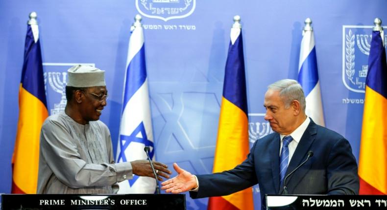 Israeli Prime Minister Benjamin Netanyahu (R) shakes hands with Chadian President Idriss Deby Itno at a joint statements in Jerusalem November 25, 2018