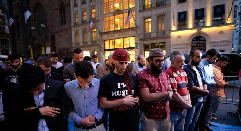 Muslims pray on Fifth Avenue near Trump Tower in New York, after Iftar, breaking fast during the holy month of Ramadan on June 1, 2017