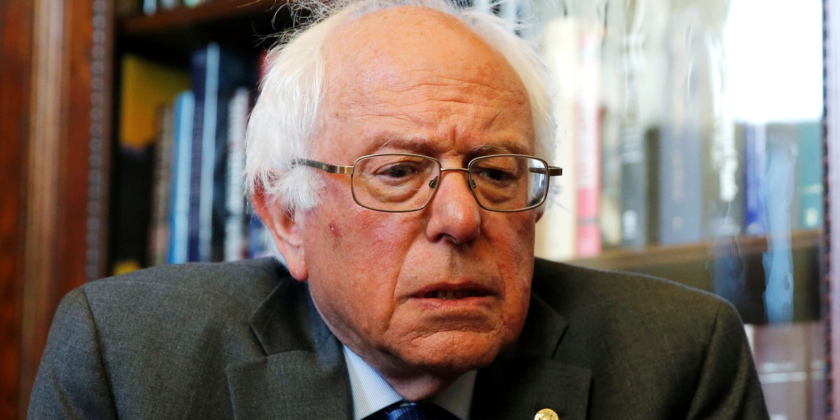 U.S. Democratic presidential candidate Bernie Sanders takes his seat to meet with U.S. Senate Minority Leader Harry Reid (D-NV) in Reid's offices at the U.S. Capitol in Washington, U.S. June 9, 2016.