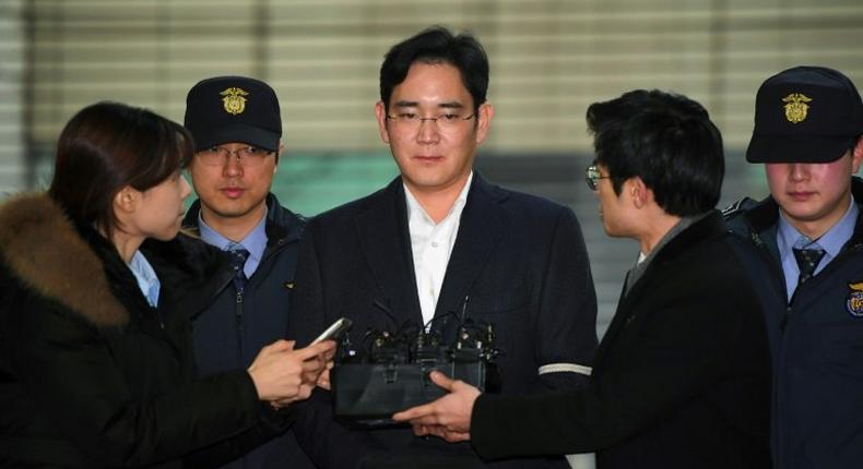 Samsung Electronics vice chairman Lee Jae-Yong (C) has been indicted on multiple charges of bribery and embezzlement