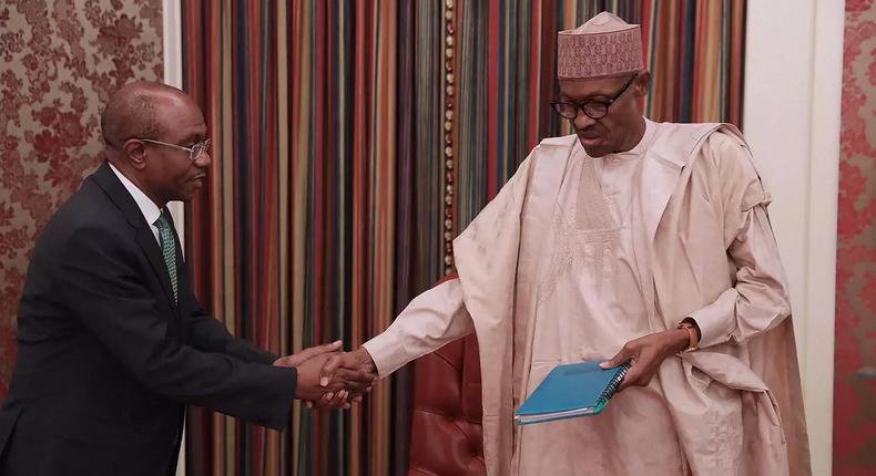 CBN Governor, Mr. Godwin Emefiele and President Buhari during recently meeting.