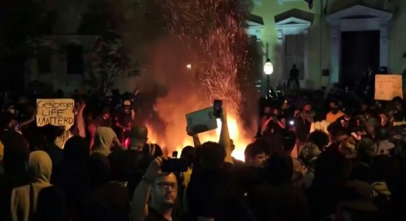 Crowds of protesters break curfew in Washington to demonstrate near the White House