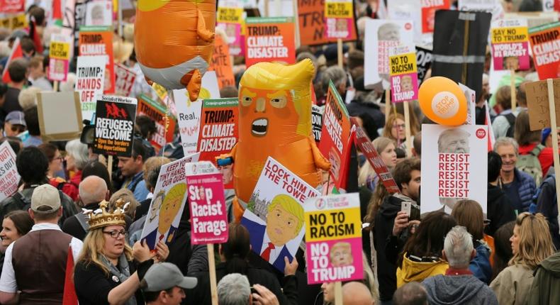 Around 2,500 people gathered under the shadow of Nelson's Column in Trafalgar Square for the Carnival of Resistance against the US leader, ahead of his meeting with outgoing British Prime Minister Theresa May at nearby Downing Street.