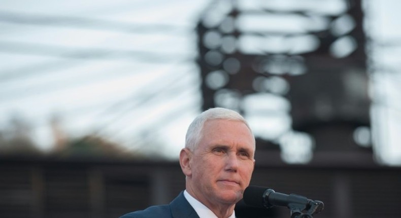 Donald Trump's running mate Mike Pence sought to ease tensions, insisting his camp would accept defeat if voters reject the Republican ticket at the polls