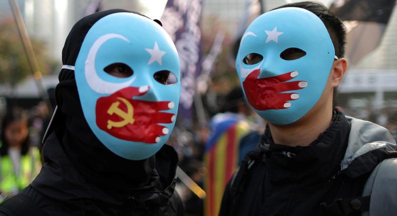 Hong Kong Uighur protest masks.JPG