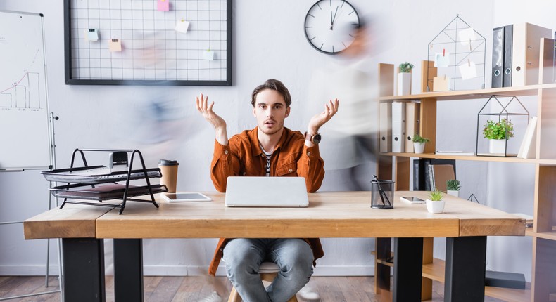 Zillennials in the workplace can feel stuck in the middle.LightFieldStudios/Getty Images